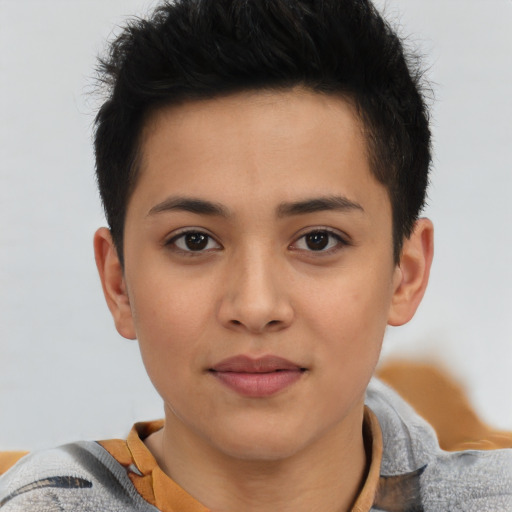 Joyful asian child female with short  brown hair and brown eyes