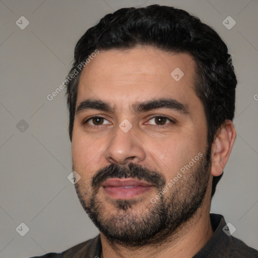 Joyful white young-adult male with short  black hair and brown eyes
