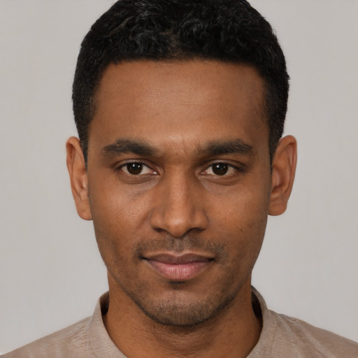 Neutral black young-adult male with short  black hair and brown eyes