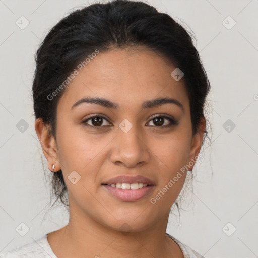 Joyful latino young-adult female with short  brown hair and brown eyes