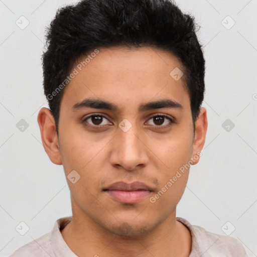 Neutral latino young-adult male with short  black hair and brown eyes