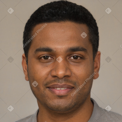 Joyful black young-adult male with short  black hair and brown eyes