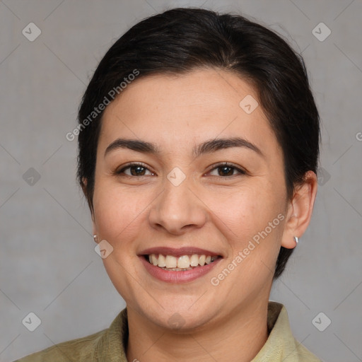 Joyful white young-adult female with medium  brown hair and brown eyes