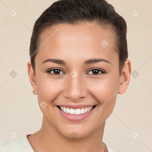 Joyful white young-adult female with short  brown hair and brown eyes