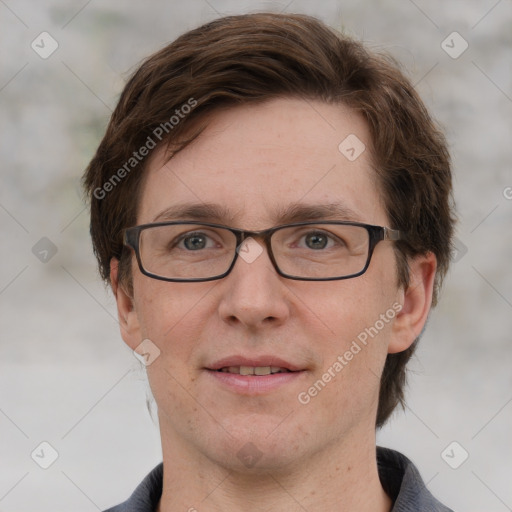 Joyful white adult male with short  brown hair and grey eyes