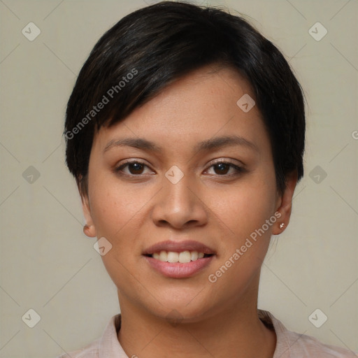 Joyful asian young-adult female with short  black hair and brown eyes