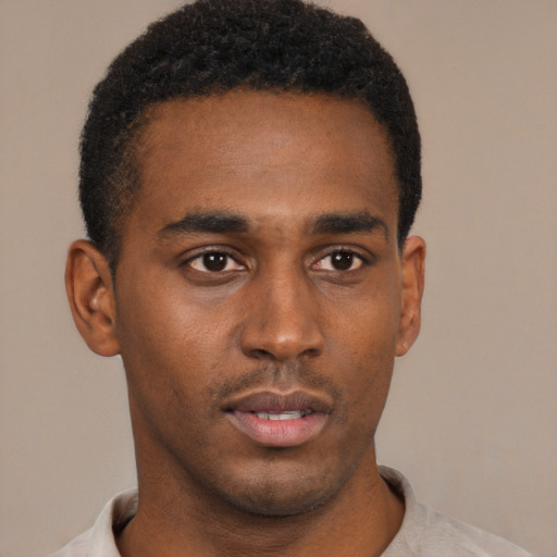 Neutral black young-adult male with short  brown hair and brown eyes