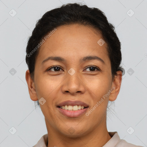 Joyful latino young-adult female with short  brown hair and brown eyes