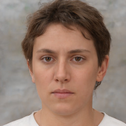 Neutral white young-adult female with short  brown hair and brown eyes