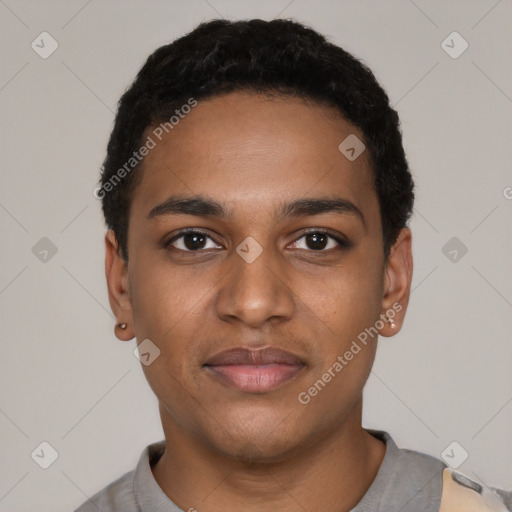 Joyful black young-adult male with short  black hair and brown eyes