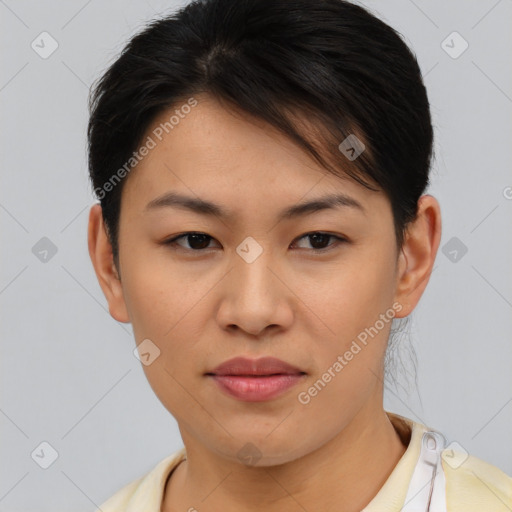 Joyful asian young-adult female with short  brown hair and brown eyes