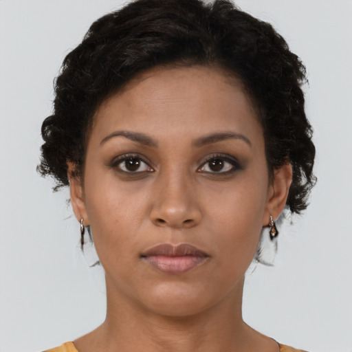 Neutral black young-adult female with short  brown hair and brown eyes