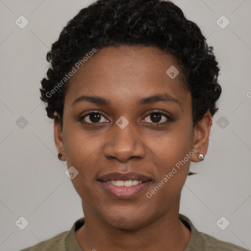 Joyful black young-adult female with short  black hair and brown eyes