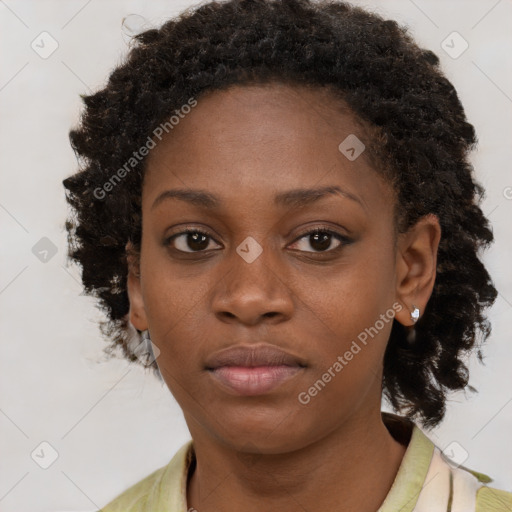 Neutral black young-adult female with short  brown hair and brown eyes