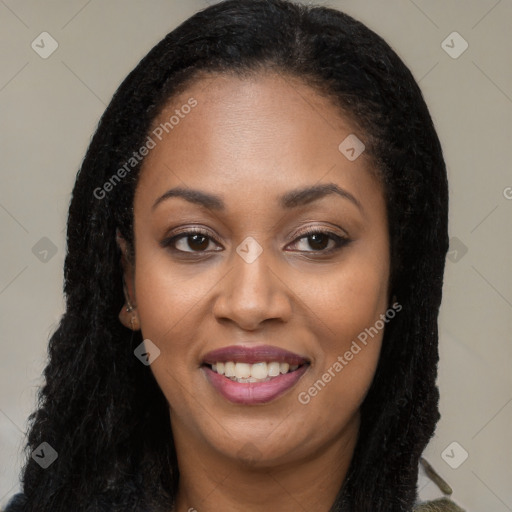 Joyful latino young-adult female with long  black hair and brown eyes