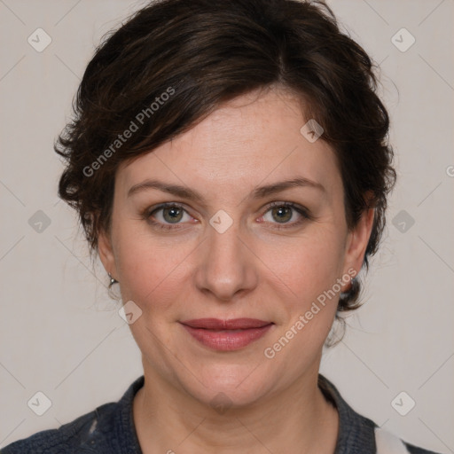 Joyful white adult female with medium  brown hair and blue eyes