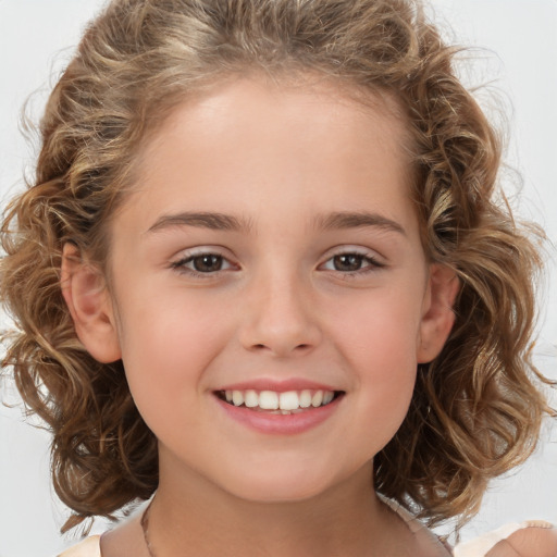 Joyful white child female with medium  brown hair and brown eyes