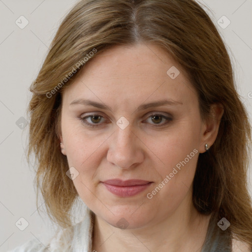 Joyful white adult female with long  brown hair and brown eyes