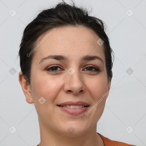 Joyful white young-adult female with short  brown hair and brown eyes