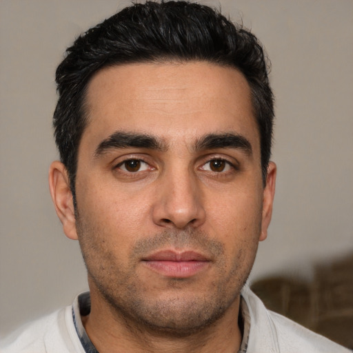 Neutral white young-adult male with short  brown hair and brown eyes