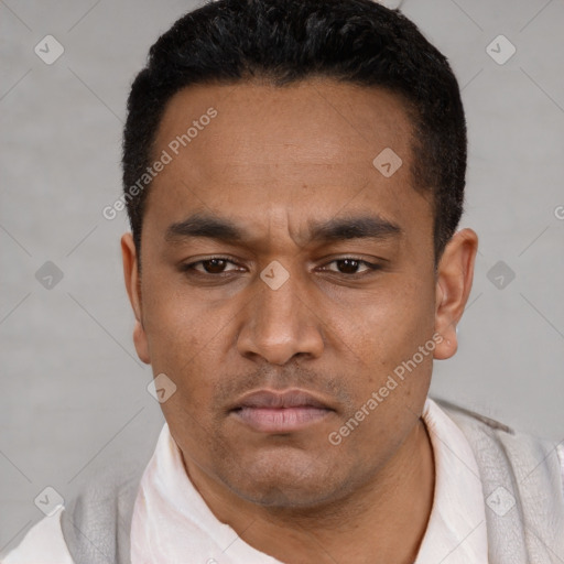 Neutral latino young-adult male with short  black hair and brown eyes