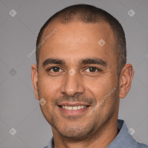 Joyful white adult male with short  brown hair and brown eyes