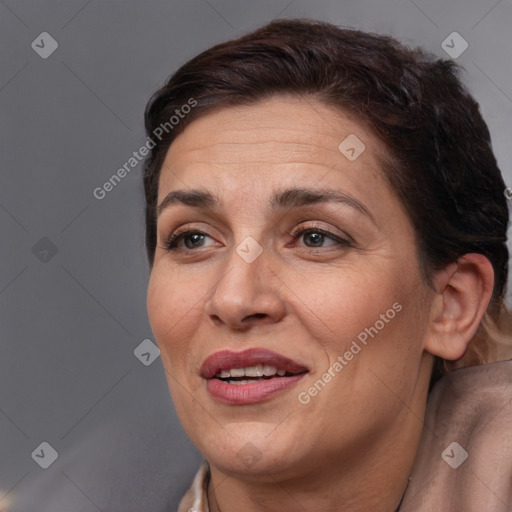 Joyful white adult female with short  brown hair and brown eyes