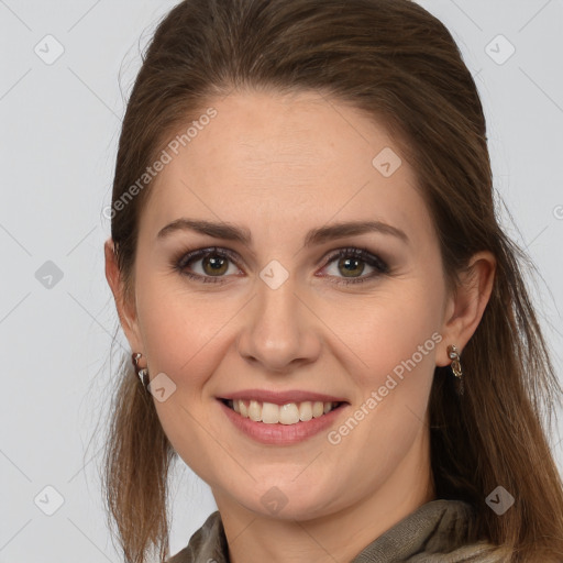 Joyful white young-adult female with long  brown hair and grey eyes