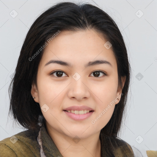 Joyful asian young-adult female with long  brown hair and brown eyes