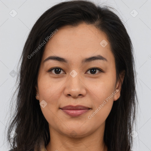 Joyful asian young-adult female with long  brown hair and brown eyes