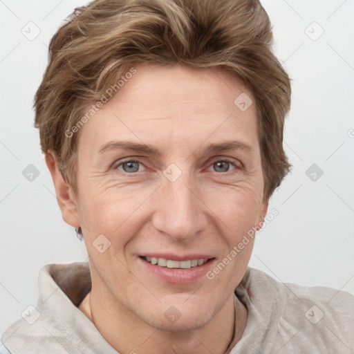 Joyful white adult female with short  brown hair and grey eyes