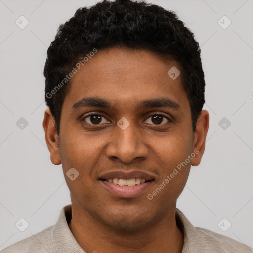Joyful black young-adult male with short  black hair and brown eyes