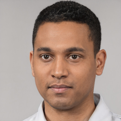 Neutral black young-adult male with short  black hair and brown eyes