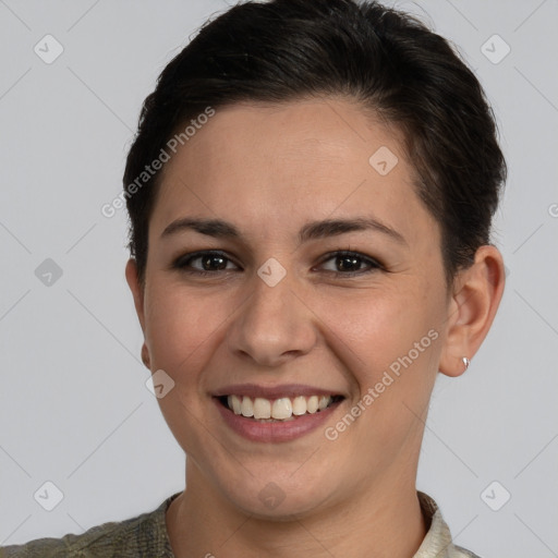 Joyful white young-adult female with short  brown hair and brown eyes