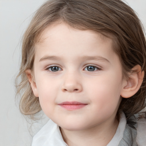 Joyful white child female with medium  brown hair and grey eyes