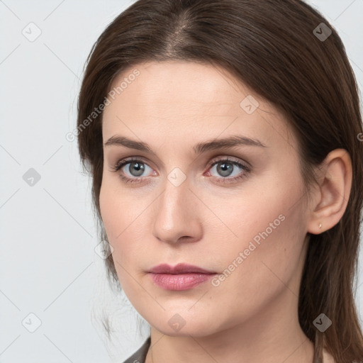 Neutral white young-adult female with medium  brown hair and grey eyes