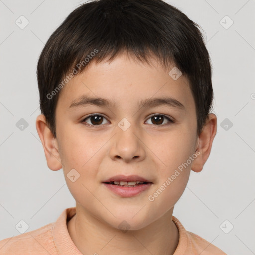 Joyful white child male with short  brown hair and brown eyes