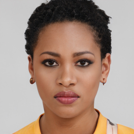 Neutral latino young-adult female with short  black hair and brown eyes