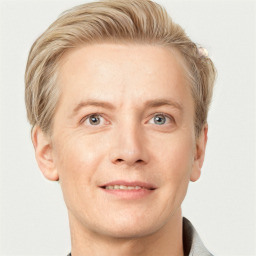 Joyful white adult male with short  brown hair and grey eyes
