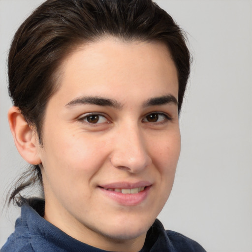 Joyful white young-adult male with medium  brown hair and brown eyes