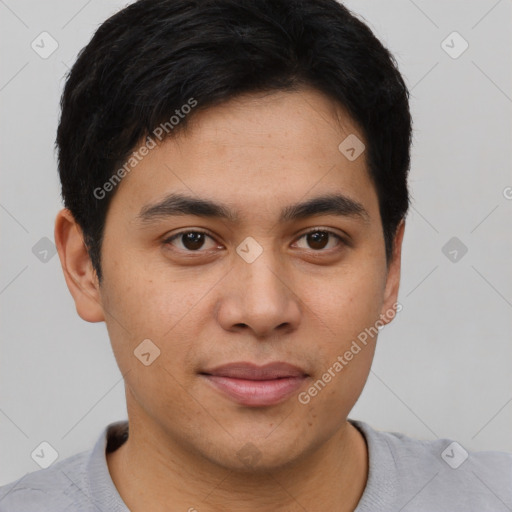 Joyful asian young-adult male with short  brown hair and brown eyes