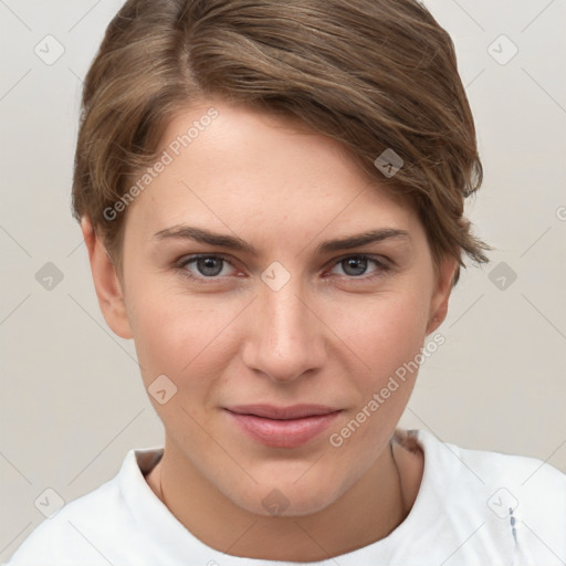 Joyful white young-adult female with short  brown hair and grey eyes