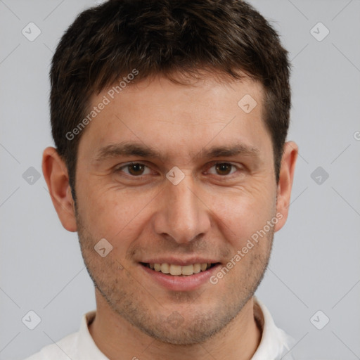 Joyful white young-adult male with short  brown hair and brown eyes