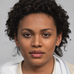 Neutral black young-adult female with short  brown hair and brown eyes