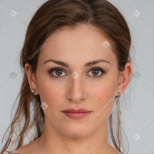 Joyful white young-adult female with long  brown hair and green eyes