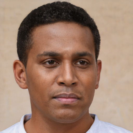 Neutral black young-adult male with short  brown hair and brown eyes