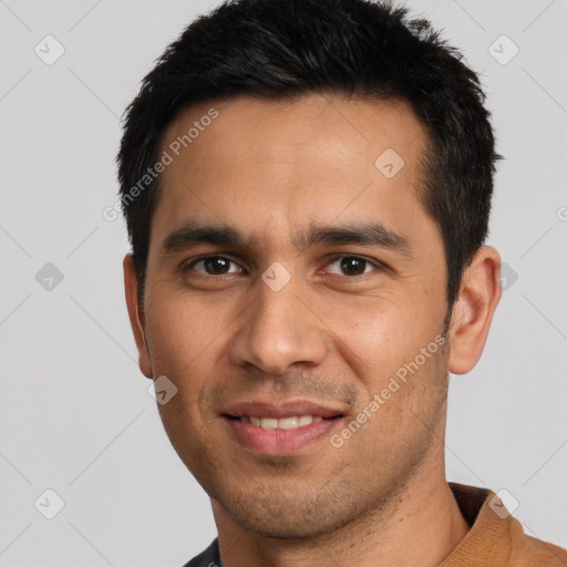 Joyful white young-adult male with short  black hair and brown eyes