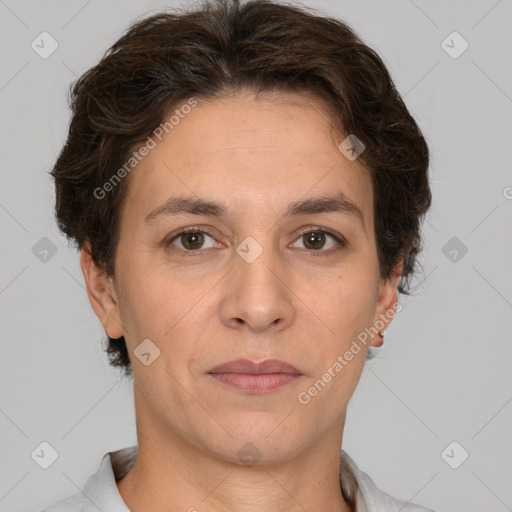 Joyful white adult female with short  brown hair and brown eyes