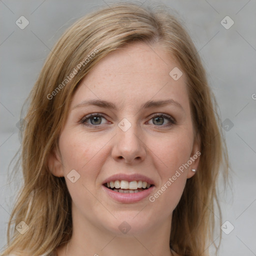 Joyful white young-adult female with medium  brown hair and blue eyes