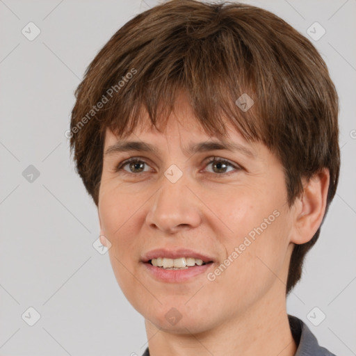 Joyful white adult female with short  brown hair and brown eyes